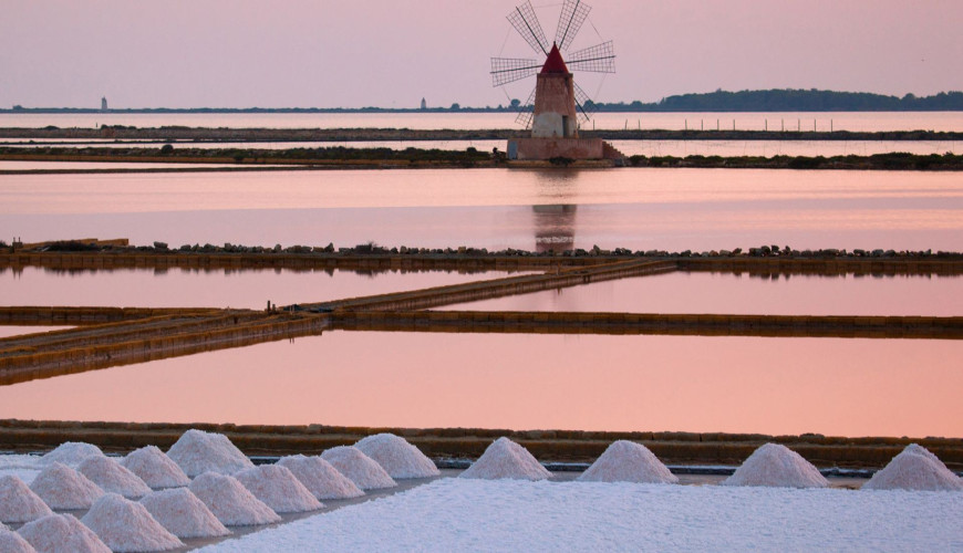 The Salt Pans of Trapani, where time is reflected in the water.