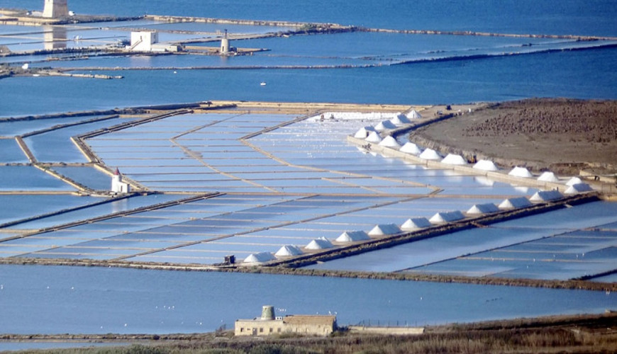 The Salt Pans of Trapani, where time is reflected in the water.