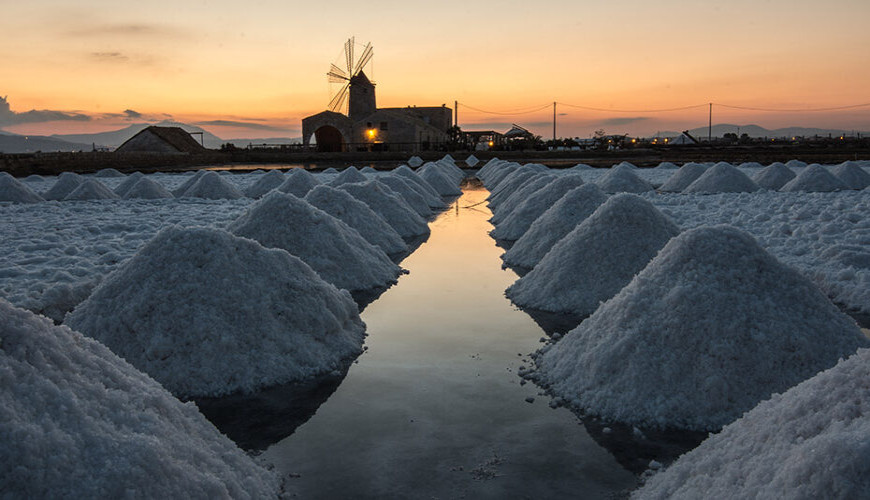 The Salt Pans of Trapani, where time is reflected in the water.