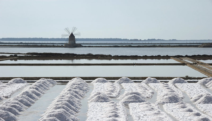 The Salt Pans of Trapani, where time is reflected in the water.