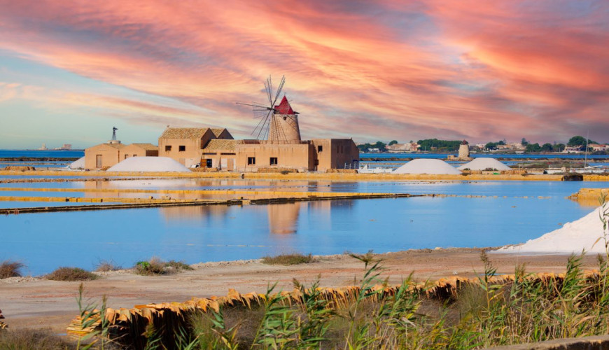 The Salt Pans of Trapani, where time is reflected in the water.